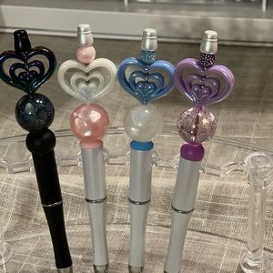 Plastic triple heart hand beaded pens sold separately